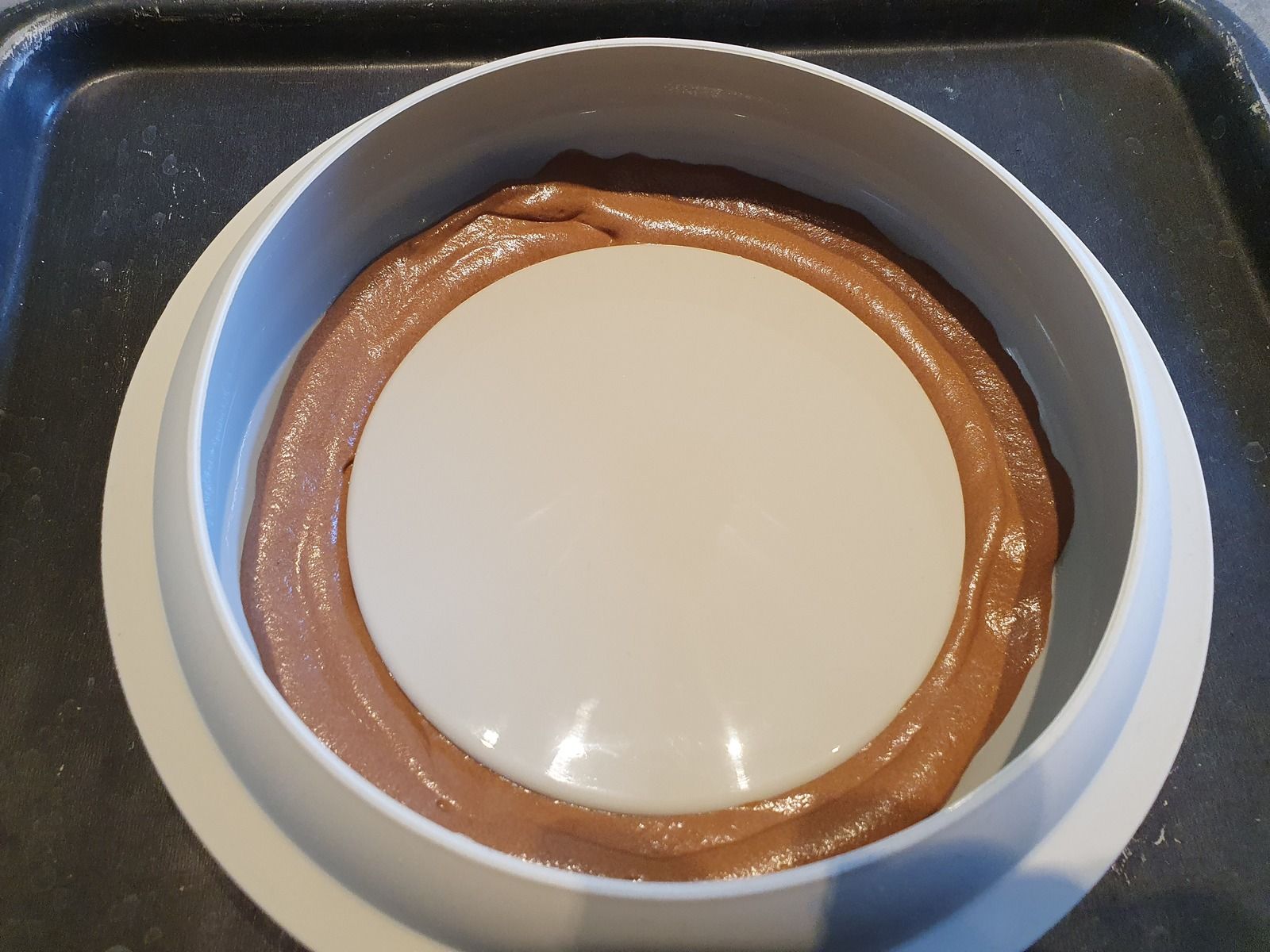 Entremet chocolat noir, citron vert, framboises