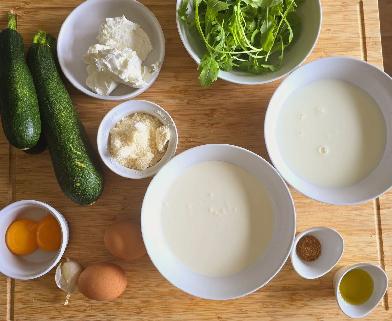Clafoutis courgettes, chèvre et roquette