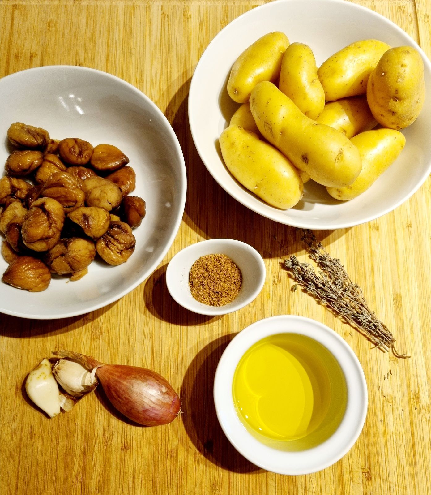 Pommes de terre et châtaignes rôties au cumin