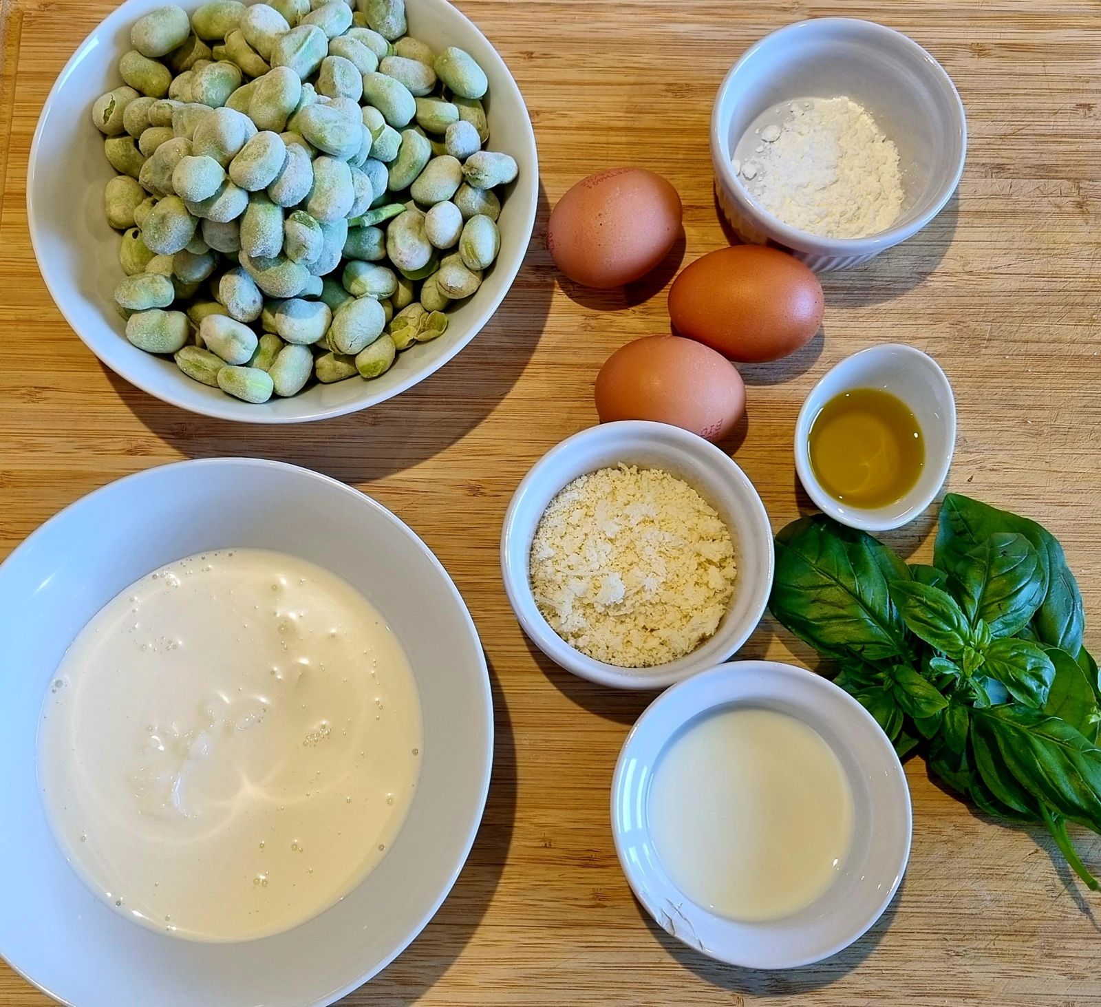 Clafoutis de fèves au basilic et parmesan