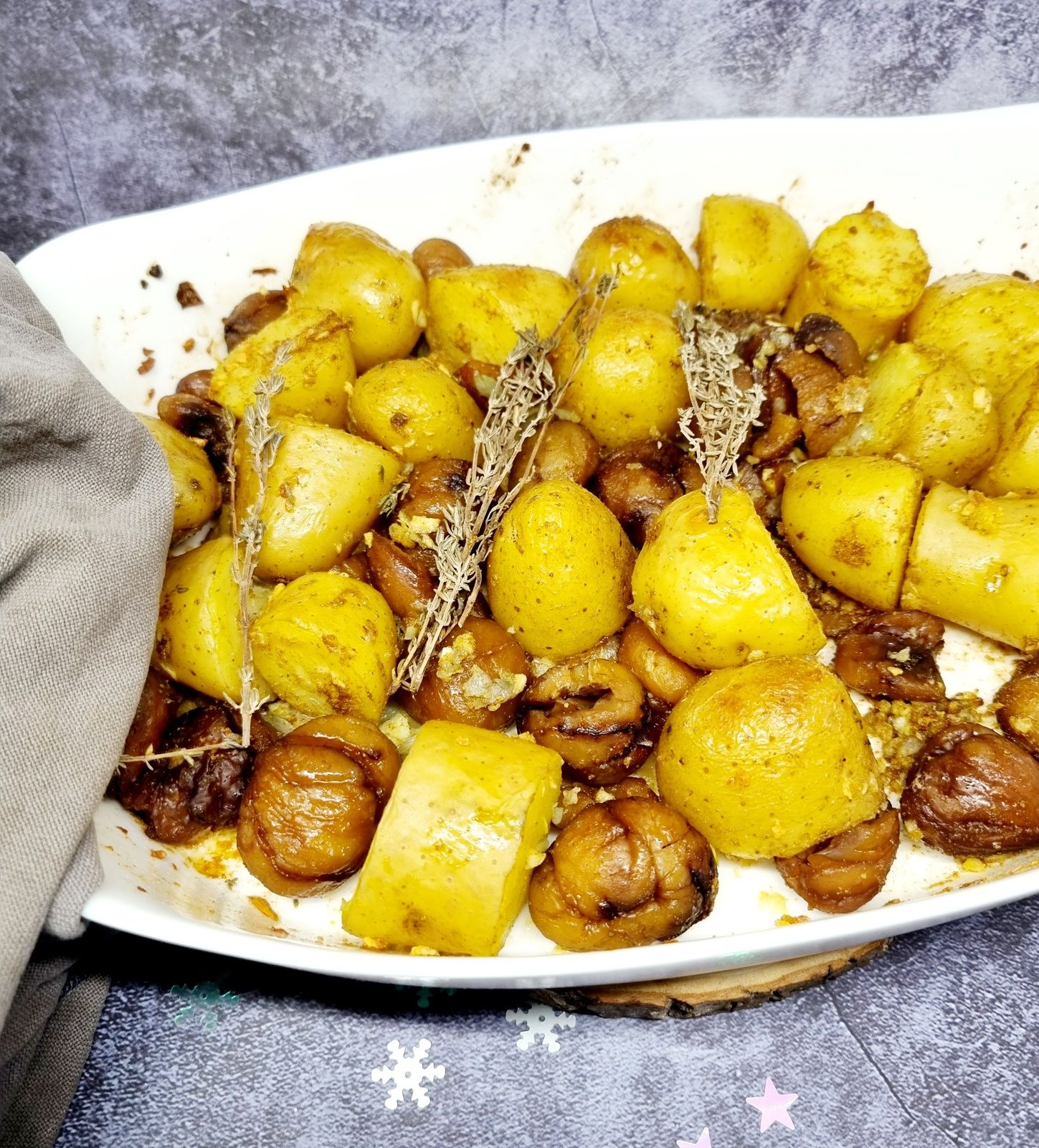 Pommes de terre et châtaignes rôties au cumin